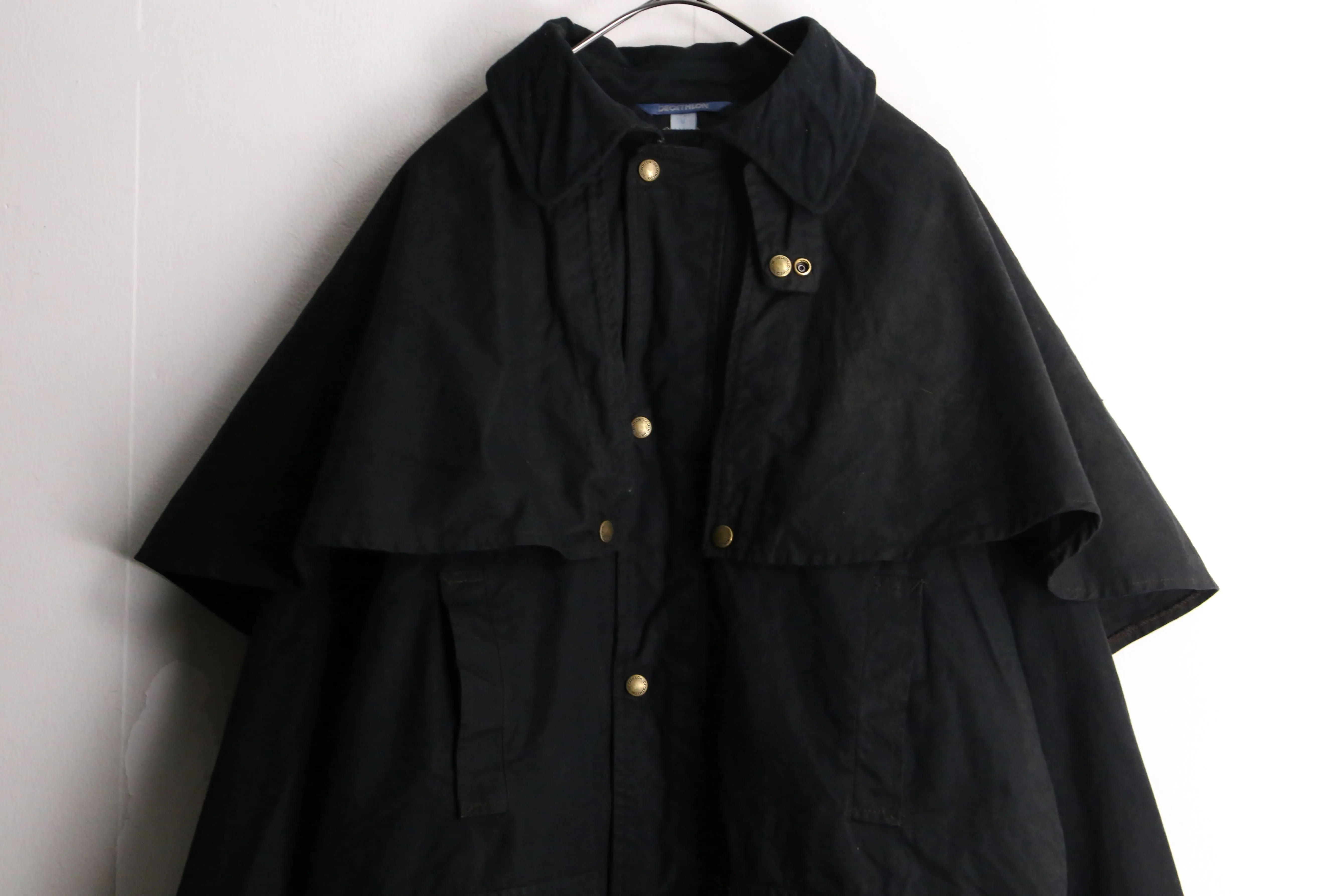 black cape design oiled jacket