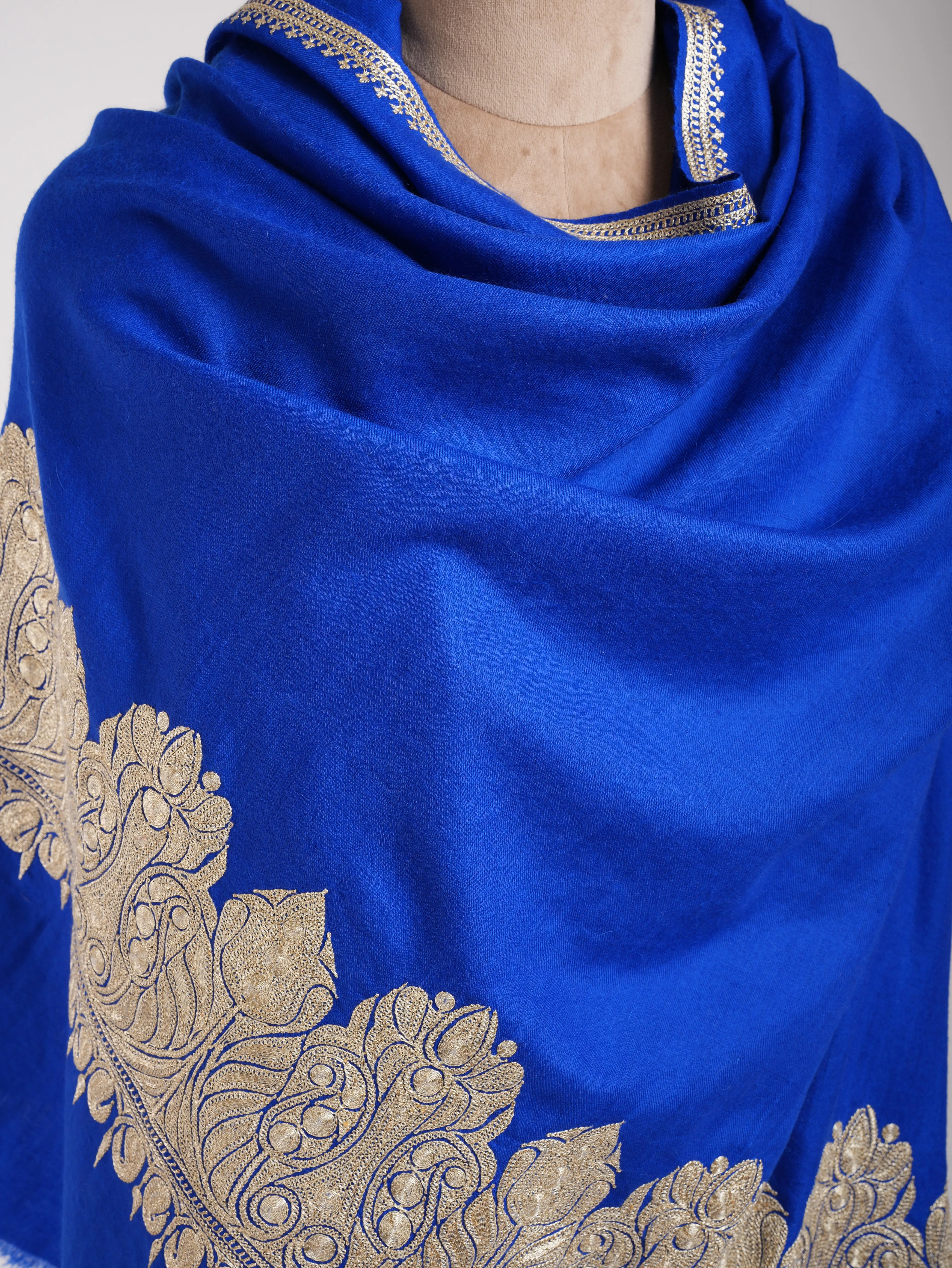 Blue Pashmina Shawl with Water Gold tilla Embroidery.