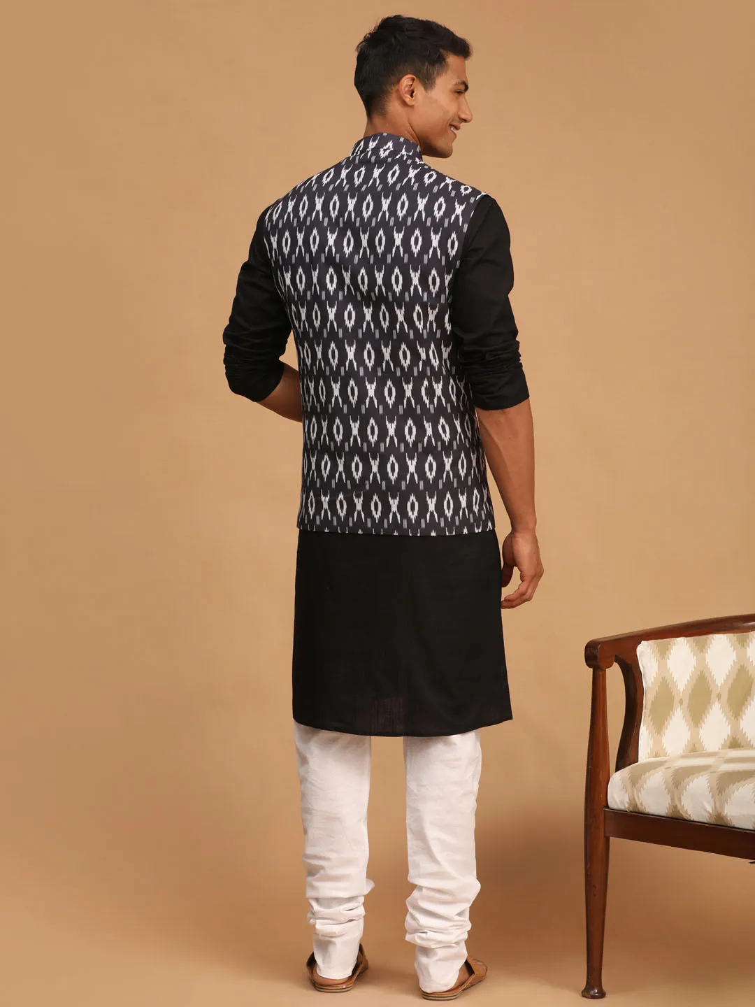 Jashvi Men's Black Ikaat Printede Cotton Nehru Jacket With Black Kurta And White Pyjama Set