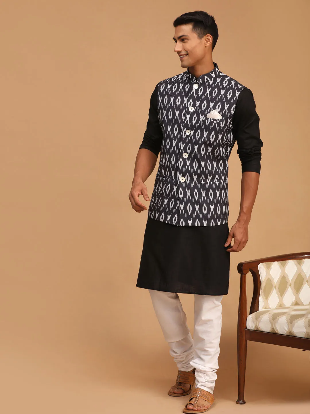 Jashvi Men's Black Ikaat Printede Cotton Nehru Jacket With Black Kurta And White Pyjama Set