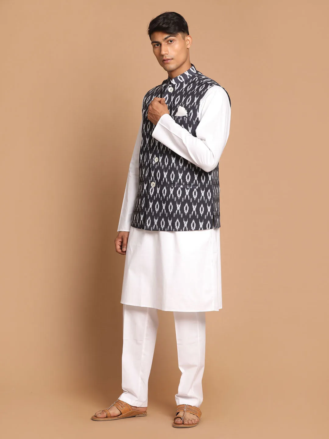 Jashvi Men's Black Ikkat Printed Cotton Nehru Jacket With White Kurta And Pyjama Set